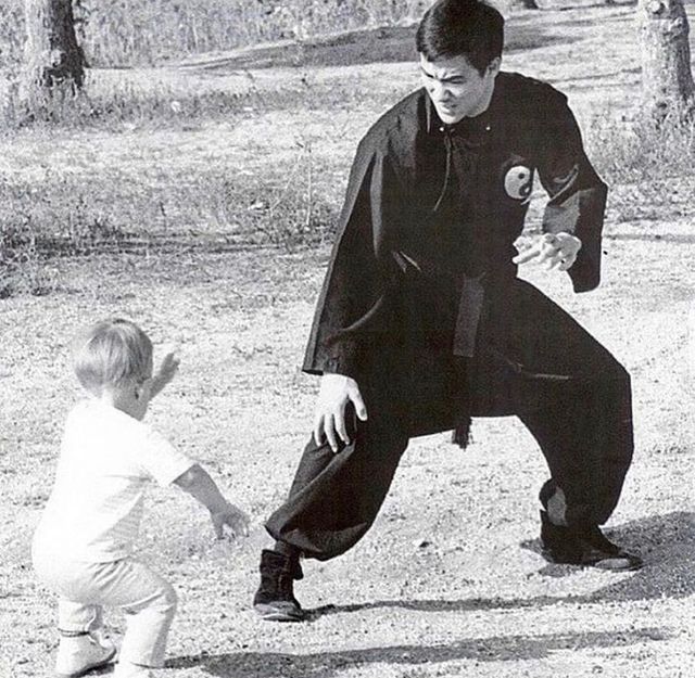 Bruce Lee teaching Brandon Lee some Kung Fu