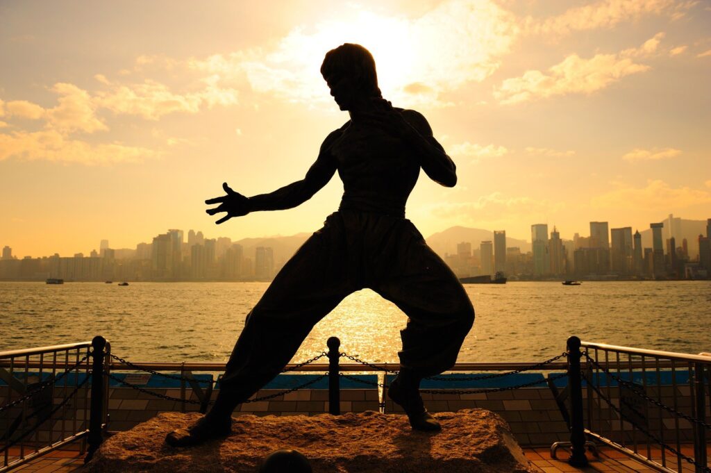 Bruce Lee statue at sunset